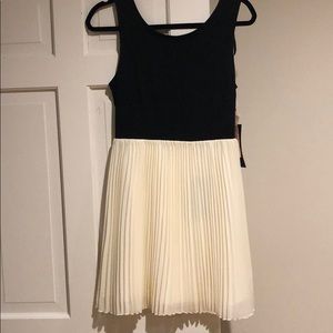 women’s size 6 dress, low v back, pleated bottom